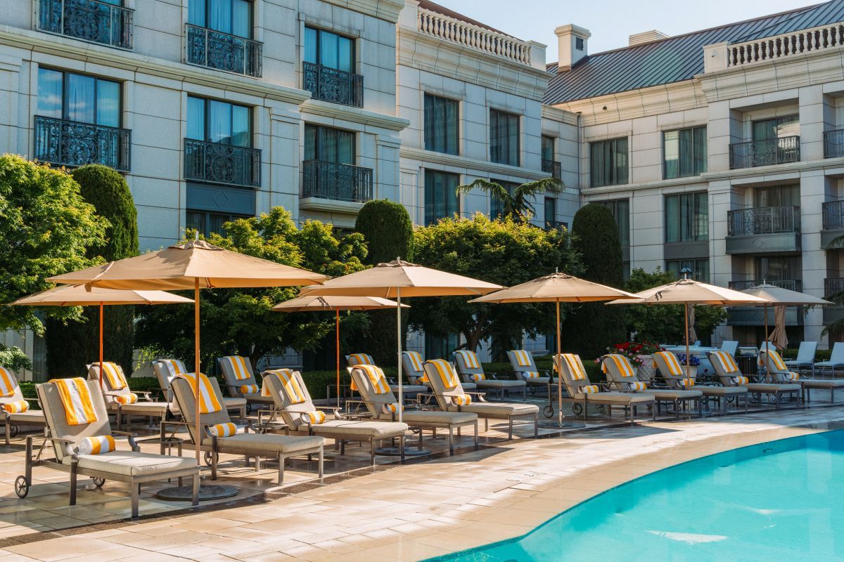 Poolside loungers next to the pool