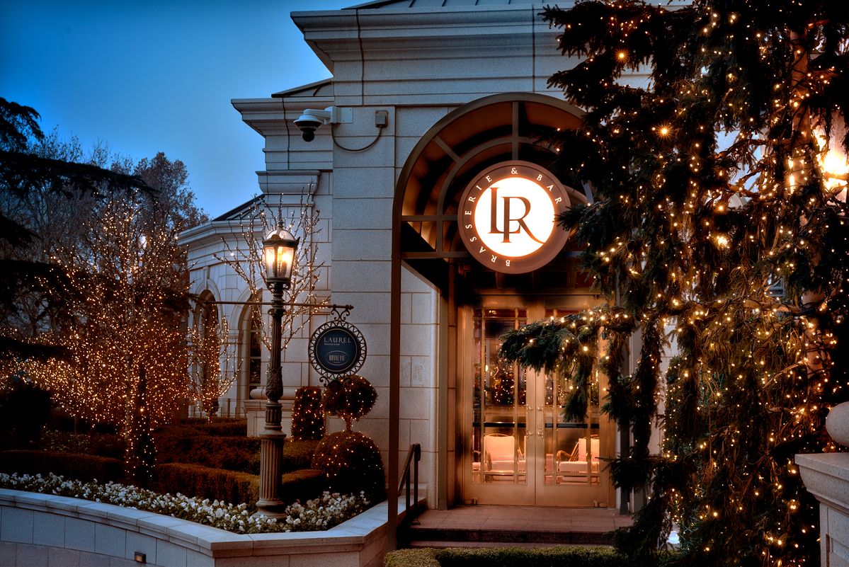 Entrance to Laurel Brasserie & Bar with holiday decorations