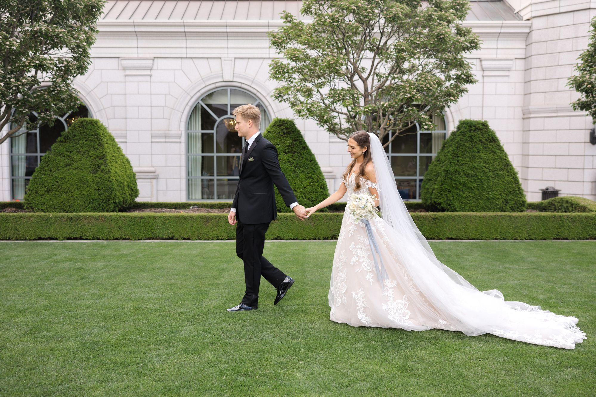 Couple in their wedding clothes.
