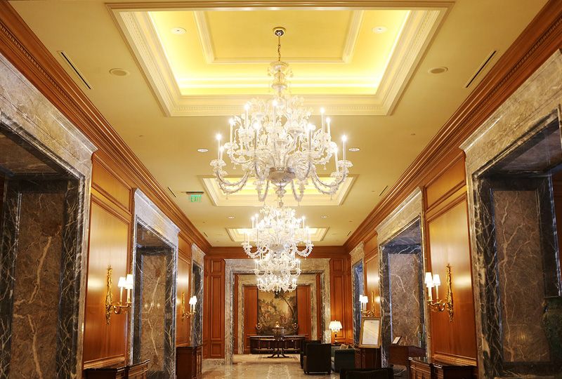 Blown glass chandeliers hanging in The Grand America Hotel's lobby.