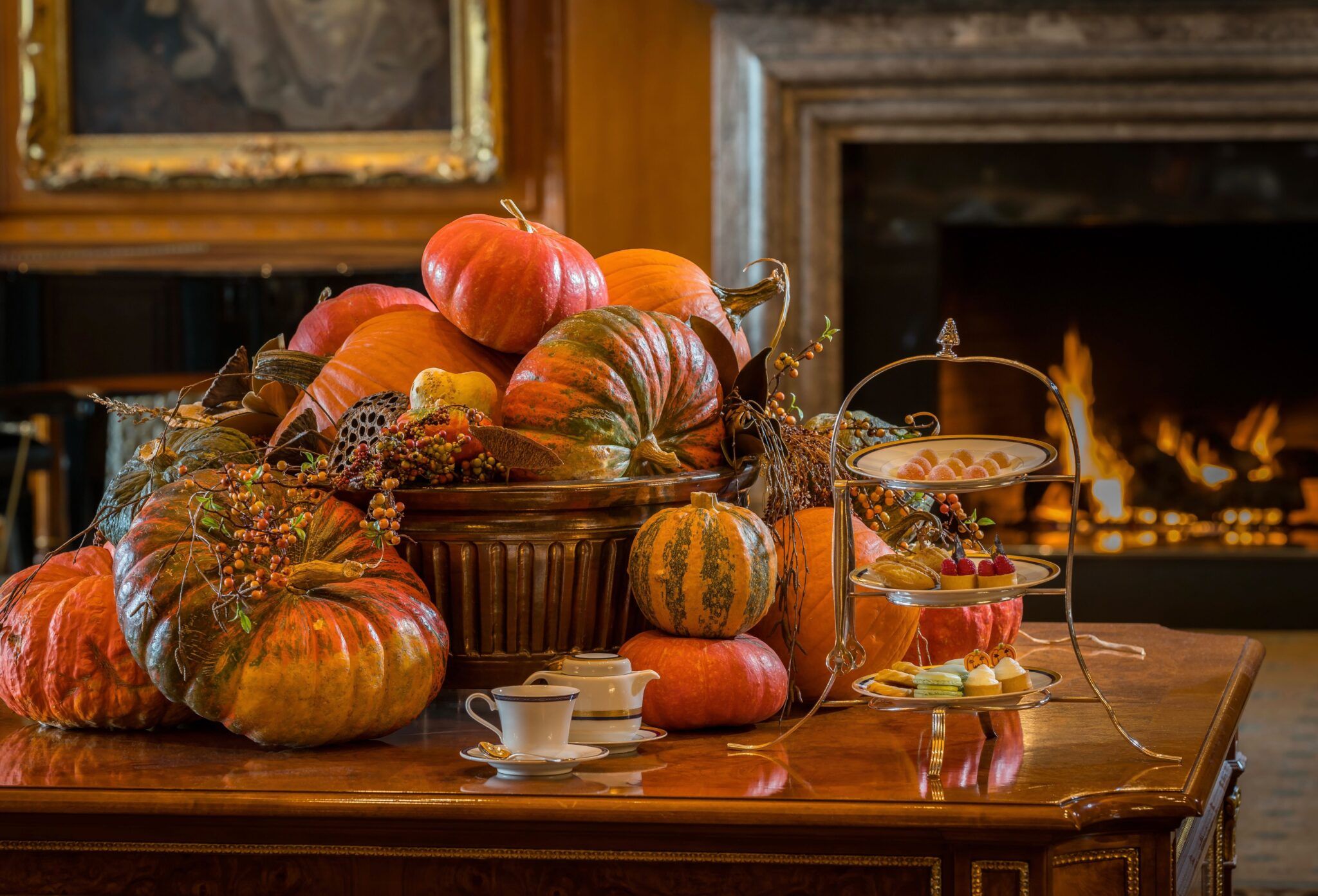 Tea cups in front of a fall display